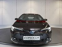 Gebraucht Toyota Corolla Team 196 PS (144 kW) 2023 Phantombraun metallic Kombi
