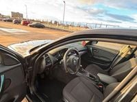 Gebraucht BMW 118 Sport Line 143 PS (105 kW) 2010 Schwarz Kleinwagen