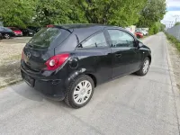 Używany Opel Corsa Edition 80 KM (58 kW) 2009 Czarny Hatchback