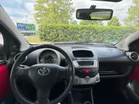Gebraucht Toyota Aygo 68 PS (50 kW) 2009 Rot Kleinwagen
