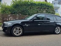 Gebraucht BMW 318 143 PS (105 kW) 2011 Schwarz Kombi