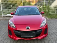 Używany Mazda 3 Active 105 KM (77 kW) 2013 Czerwony Sedan/Limuzyna