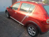Gebraucht Dacia Sandero Stepway 90 PS (66 kW) 2010 Rot Kleinwagen