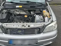 Second-hand Opel Astra 86 CP (63 kW) 2001 Argintiu Coupe