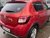 Gebraucht Dacia Sandero Prestige 90 PS (66 kW) 2016 Feuerrot SUV