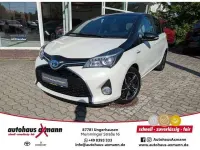 Gebraucht Toyota Yaris Hybrid Style 101 PS (74 kW) 2016 Montblancweiß/dach schwarz Limousine