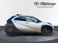 Gebraucht Toyota Aygo X Style 72 PS (52 kW) 2022 Ginger beige metallic/ night sky black SUV