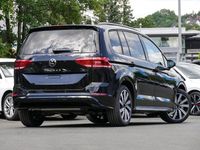 Gebraucht VW Touran Highline 150 PS (110 kW) 2025 Grenadillschwarz metallic Van / Kleinbus