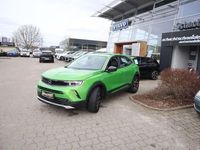 Gebraucht Opel Mokka-e Elegance 100 kW (136 PS) 2022 Matcha grün metallic SUV