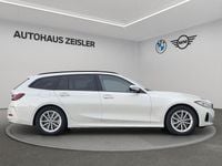 Gebraucht BMW 330e Sport Line 184 PS (135 kW) 2024 Mineralweiß Kombi