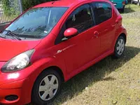 Gebraucht Toyota Aygo 68 PS (50 kW) 2009 Rot Kleinwagen