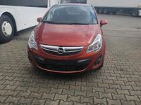 Gebraucht Opel Corsa 87 PS (63 kW) 2012 Orange Kleinwagen