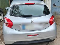 Second-hand Peugeot 208 68 CP (50 kW) 2012 Argintiu Hatchback