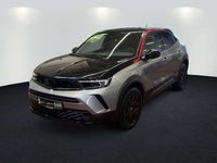 Gebraucht Opel Mokka GS Line 131 PS (96 kW) 2023 Kontrast grau/quarz silber SUV