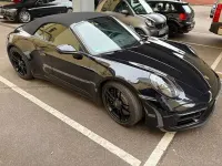 Gebraucht Porsche 911 480 PS (353 kW) 2023 Tiefschwarz (metallic) Cabrio