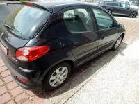 Używany Peugeot 206 Basis 75 KM (55 kW) 2009 Czarny Sedan/Limuzyna