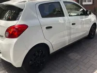 Gebraucht Mitsubishi Space Star 71 PS (52 kW) 2013 Weiß Van / Kleinbus