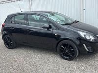 Używany Opel Corsa Active 87 KM (63 kW) 2013 Czarny Hatchback