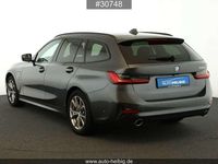 Gebraucht BMW 330e Sport Line 252 PS (185 kW) 2022 Mineralgrau metallic Kombi