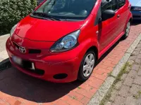 Gebraucht Toyota Aygo 68 PS (50 kW) 2009 Rot Kleinwagen