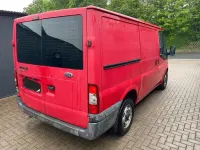 Używany Ford Transit 86 KM (63 kW) 2009 Czerwony Sedan/Limuzyna