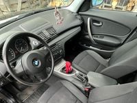 Gebraucht BMW 116 122 PS (89 kW) 2009 Schwarz Kleinwagen