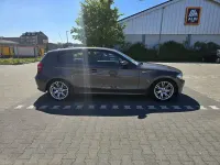 Używany BMW 116 Performance 122 KM (89 kW) 2009 Brązowy Hatchback
