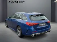 Gebraucht Mercedes C300e AMG line 313 PS (230 kW) 2024 Metalliclack spektralblau Kombi
