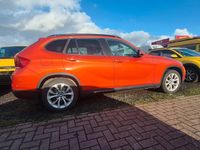 Second-hand BMW X1 Performance 218 CP (160 kW) 2015 Portocaliu SUV