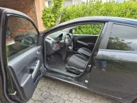 Używany Mazda 2 Prime-Line 75 KM (55 kW) 2014 Czarny Sedan/Limuzyna