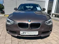 Gebraucht BMW 125 Sport Line 218 PS (160 kW) 2014 Sparkling bronze (metallic) Kleinwagen
