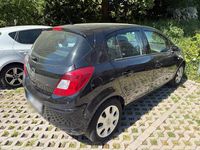 Second-hand Opel Corsa 86 CP (63 kW) 2011 Negru Hatchback