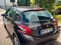 Gebraucht Peugeot 208 Active 82 PS (60 kW) 2013 Braun Kleinwagen