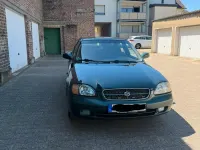 Gebraucht Suzuki Baleno 85 PS (62 kW) 2001 Grün Limousine
