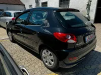 Gebraucht Peugeot 206+ 75 PS (55 kW) 2010 Schwarz Kleinwagen