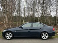 Second-hand BMW 318 143 CP (105 kW) 2009 Albastru Berlinǎ