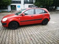 Gebraucht Kia Rio 109 PS (80 kW) 2006 Rot Limousine