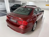 Second-hand BMW 330 272 CP (200 kW) 2010 Roșu Berlinǎ
