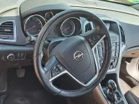 Używany Opel Astra 101 KM (74 kW) 2015 Szary Sedan/Limuzyna