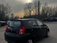 Gebraucht Nissan Pixo Acenta 68 PS (50 kW) 2010 Schwarz Kleinwagen