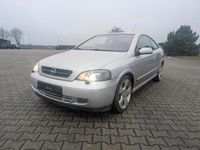 Second-hand Opel Astra 146 CP (107 kW) 2003 Argintiu Coupe