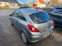 Gebraucht Opel Corsa 69 PS (50 kW) 2012 Silber Kleinwagen