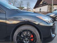 Używany Mazda 3 Edition 105 KM (77 kW) 2012 Czarny Sedan/Limuzyna
