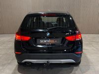 Second-hand BMW X1 143 CP (105 kW) 2015 Negru SUV