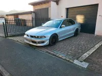 Second-hand Mitsubishi Galant 160 CP (117 kW) 2001 Argintiu Berlinǎ