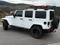 Gebraucht Jeep Wrangler Unlimited Sahara 284 PS (208 kW) 2016 Weiß SUV