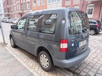 Second-hand VW Caddy Team 105 CP (77 kW) 2010 Gri Monovolum