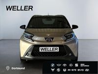 Gebraucht Toyota Aygo 72 PS (52 kW) 2022 Ginger beige / night sky black Kleinwagen