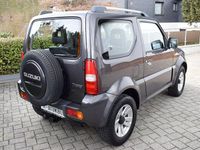 Usado Suzuki Jimny Style 86 HP (63 kW) 2012 Cinzento SUV