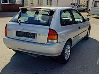 Second-hand Mazda 323 73 CP (53 kW) 1999 Argintiu Berlinǎ